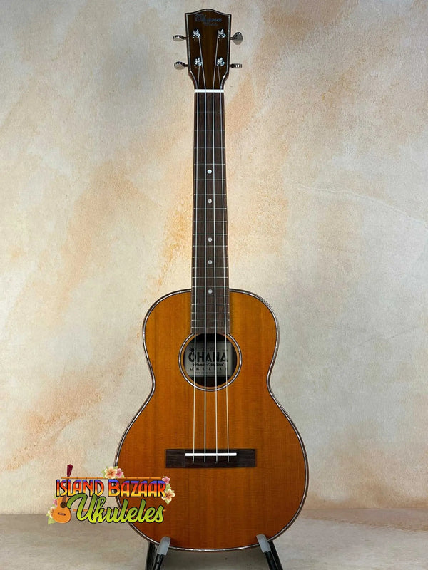 Wooden baritone ukulele with honey finish from Ohana TK-50G Solid Cedar Rosewood tenor