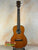 Wooden baritone ukulele with honey finish from Ohana TK-50G Solid Cedar Rosewood tenor