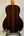 Acoustic guitar with dark striped wood grain back, highlighting Ohana TK-50G Rosewood Tenor Ukulele