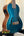 Teal blue Kala Archtop Tenor Ukulele with wooden sides and classic archtop design