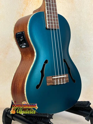 Teal blue Kala Archtop Tenor Ukulele with wooden sides and classic archtop design