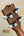 Wooden headstock of Kala Archtop Tenor Ukulele with white tuning pegs, classic archtop design