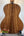 Acoustic guitar with rich brown wood grain for Cedar & Acacia Tenor Ukulele display