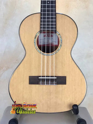 Natural wood Kala Cedar & Acacia Tenor Ukulele with rosette and black bridge