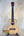 Natural wood Cedar & Acacia Tenor Ukulele on display stand at Island Bazaar Ukes