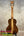 Kala Contour Series Tenor Ukulele with dark wood body and light wood stripe, solid acacia
