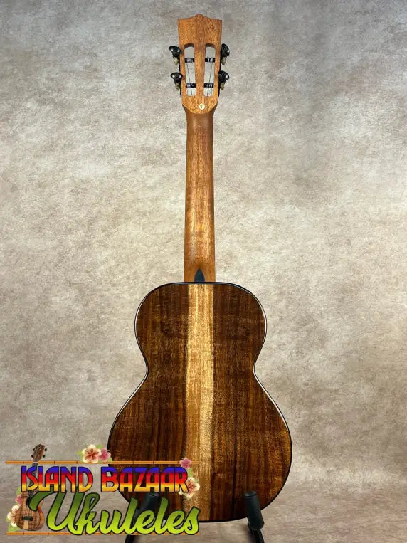 Kala Contour Series Tenor Ukulele with dark wood body and light wood stripe, solid acacia