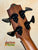 Bass guitar headstock with black tuning pegs on Kala EM-FS Exotic Macawood Tenor Ukulele