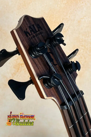 Bass guitar headstock with black tuning pegs on Kala EM-FS Exotic Macawood Tenor Ukulele