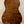 Acoustic guitar featuring rich brown wood grain, ideal for Kala EM-FS Exotic Macawood Tenor