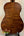 Acoustic guitar featuring rich brown wood grain, ideal for Kala EM-FS Exotic Macawood Tenor