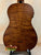 Acoustic guitar featuring rich brown wood grain, ideal for Kala EM-FS Exotic Macawood Tenor