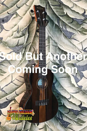 Dark wooden Kala Ziricote Tenor Ukulele with four strings and inches fingerboard width