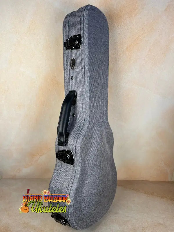 Grey hardshell guitar case with latches, part of Kala GTC-AT Concert Ukulele Bag