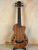 Acoustic-electric Kala Journeyman U•BASS® with f-holes and natural wood finish