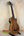 Acoustic-electric bass ukulele with f-holes and wood finish, Kala Journeyman U•BASS®