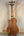 Back view of Kala Journeyman U•BASS® with black tuning pegs and wooden body