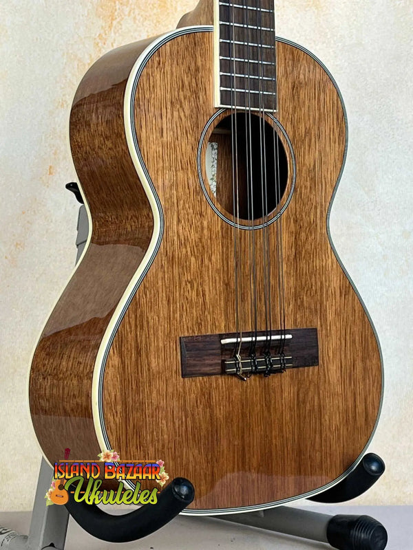 Wooden Kala KA-8 Eight-String Tenor Ukulele with glossy finish on display stand