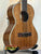 Wooden Kala KA-8 Eight-String Tenor Ukulele with glossy finish on display stand