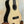 Natural wood Kala KA-ASZCT-ST Super Tenor Ukulele with black binding on a stand