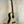 Natural wood Kala KA-ASZCT-ST Super Tenor Ukulele with black trim and four strings