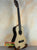 Natural wood Kala KA-ASZCT-ST Super Tenor Ukulele with black trim and four strings