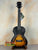 Sunburst acoustic-electric Archtop Tenor Ukulele, Kala KA-JTE-2TS, with f-holes and black headstock