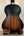 Acoustic guitar with sunburst finish on wood stand, featuring Kala KA-JTE-2TS Archtop Tenor
