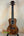 Beautiful koa wood ukulele with dark grain patterns from Kala KA-SA-C Acacia Concert Ukulele