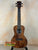 Beautiful koa wood ukulele with dark grain patterns from Kala KA-SA-C Acacia Concert Ukulele