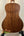 Acoustic guitar with rich brown back, part of Kala KA-SA-C Acacia Concert Ukulele