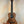 Wooden Kala KA-SA-T Acacia Tenor Ukulele featuring dark grain and four strings