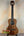 Wooden Kala KA-SA-T Acacia Tenor Ukulele featuring dark grain and four strings