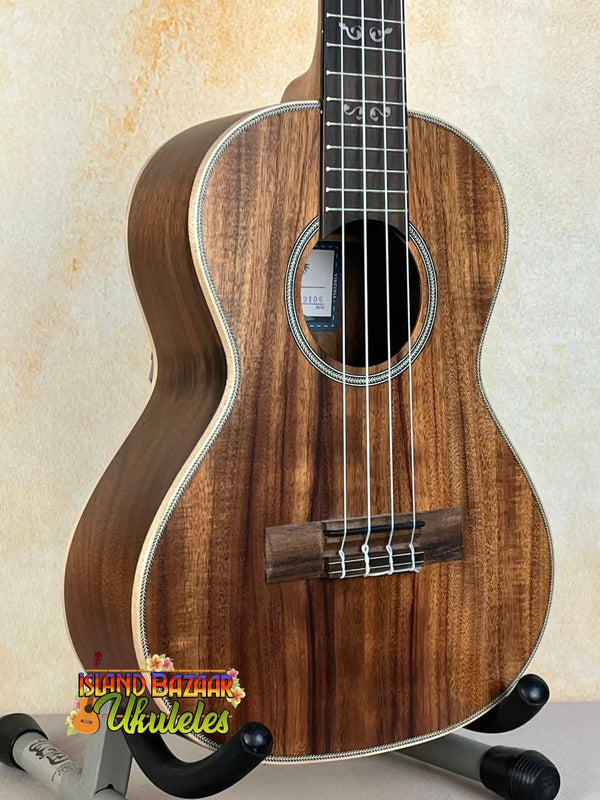 Beautiful Kala KA-SA-T Acacia Tenor Ukulele showcasing rich koa wood grain and binding