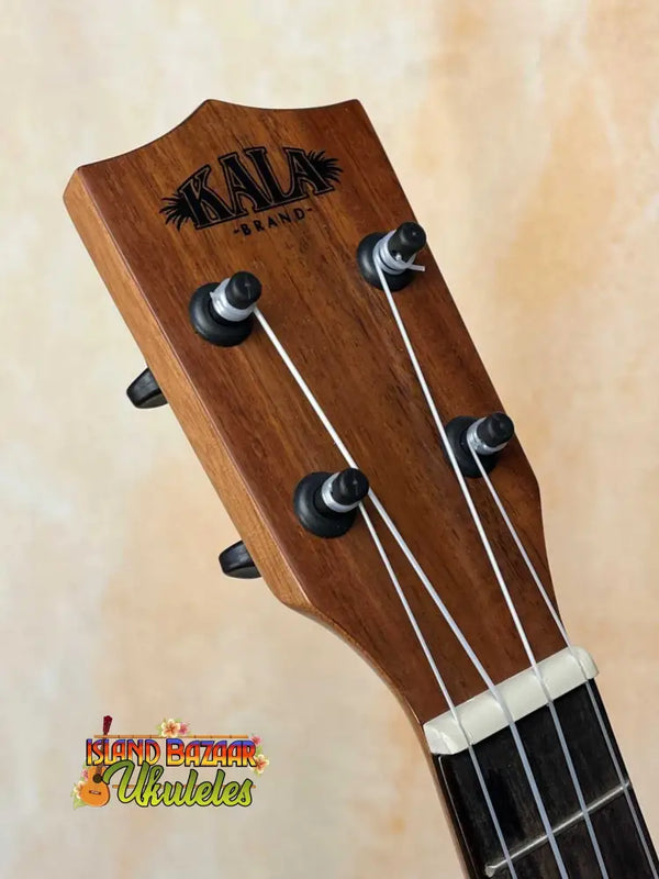 Kala KA-SCAC-C Concert Ukulele headstock with tuning pegs and strings details