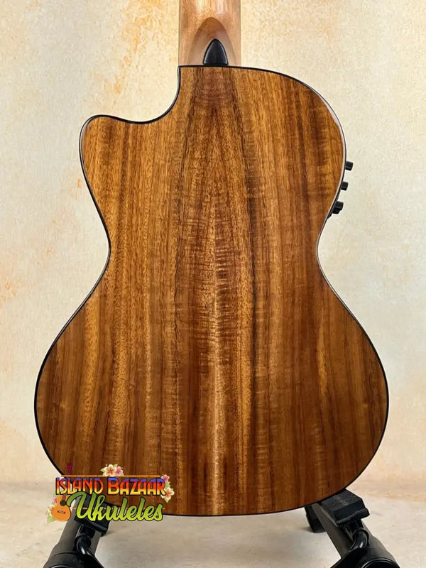 Acoustic guitar with koa wood back, featured in Kala KA-SCAC-T-CE Tenor Ukulele