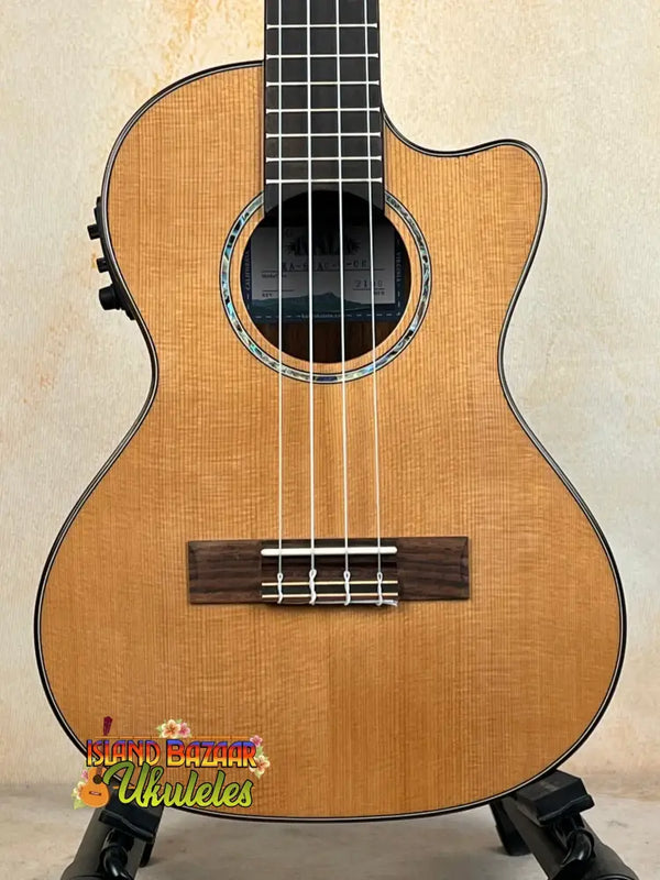 Acoustic-electric Kala KA-SCAC-T-CE Tenor Ukulele in natural wood with decorative rosette