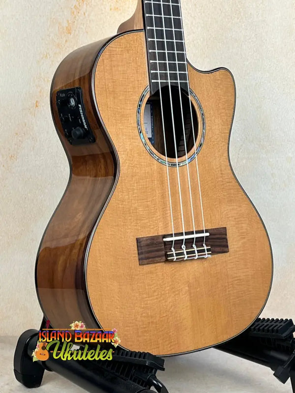 Acoustic-electric Kala KA-SCAC-T-CE Tenor Ukulele with natural wood finish and cutaway body