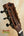 Wooden guitar headstock and black tuning pegs on Kala KA-SCAC-T6 Cedar Tenor Ukulele