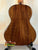 Wooden acoustic guitar with brown grain patterns beside Kala KA-SCAC-T6 6-string tenor ukulele