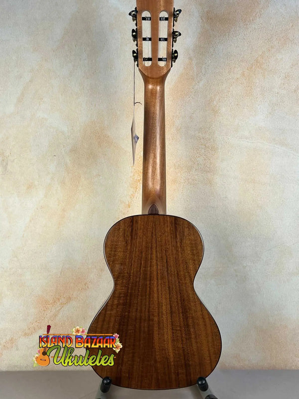 Classical acoustic guitar with wooden body highlighting Kala KA-SCAC-T6 6-string tenor ukulele