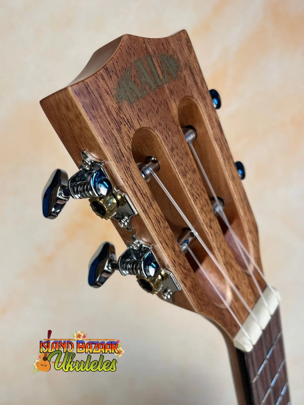 Wooden guitar headstock with black tuning pegs on Kala KA-SMH-TG-CE Tenor Electric Ukulele