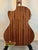 Acoustic guitar with brown wooden back panel beside Kala KA-SMH-TG-CE Tenor Electric Ukulele