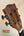 Wooden headstock of Kala KA-SMH-TG Solid Mahogany Tenor Ukulele with black tuning pegs