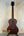 Wooden Kala KA-SMHT Tenor Ukulele with dark brown finish and black tuning pegs