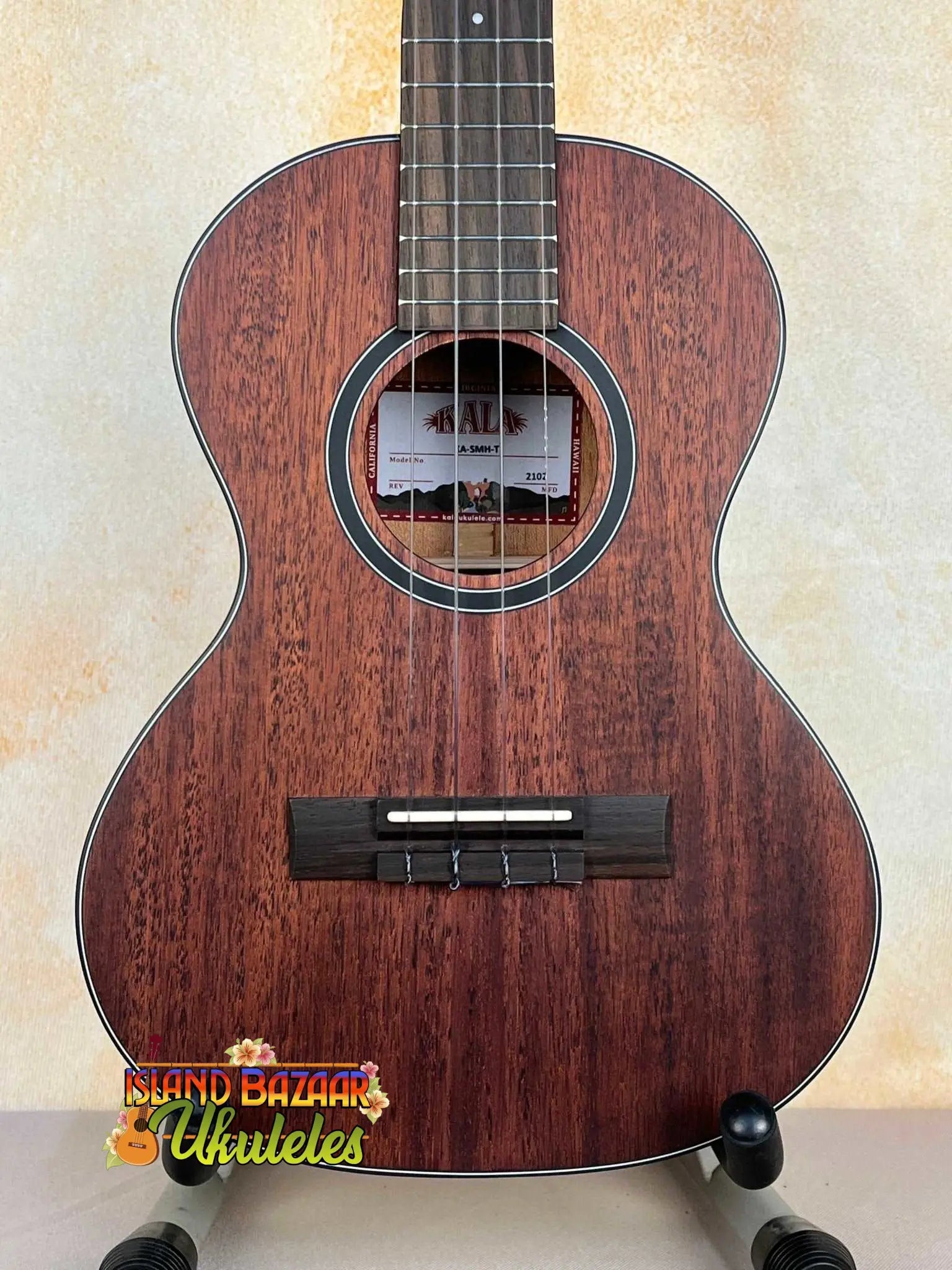 Mahogany tenor ukulele with dark wood grain and black bridge, Kala KA-SMHT Tenor Ukulele