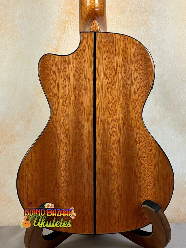 Acoustic guitar with stunning wood grain, featured in Kala KA-STGE-C Tenor Ukulele