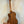 Wooden acoustic guitar showcasing grain patterns in Kala KA-STGE-C Tenor Ukulele Spruce Mahogany Cutaway