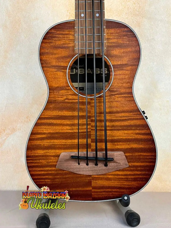 Beautiful brown Kala Left-Handed U-Bass with flamed wood grain and black strings