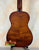 Classical acoustic guitar with a rich brown finish for Kala Left-Handed U-Bass Ukulele